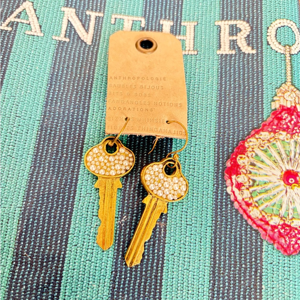 Anthropologie Gold and White Key Earrings